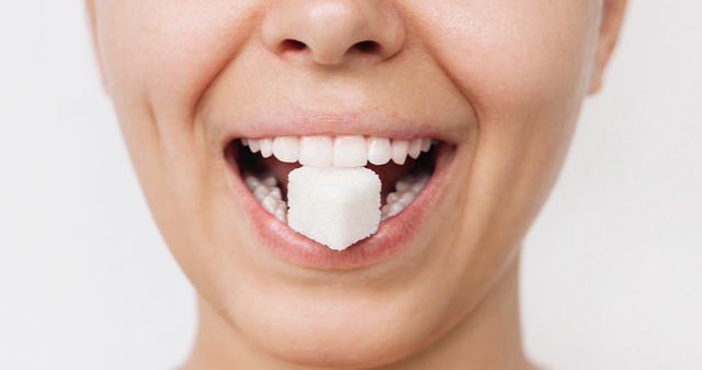 Hvad gør sukker ved dine tænder?